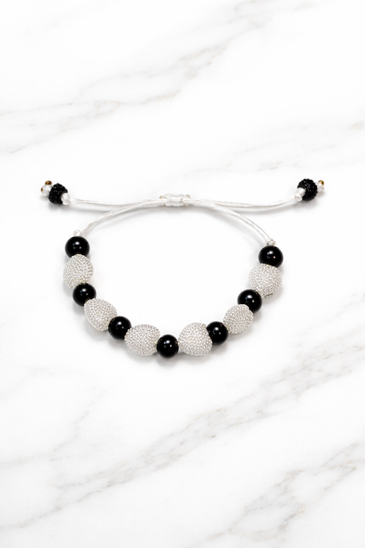 Pulsera de perlas e hilo